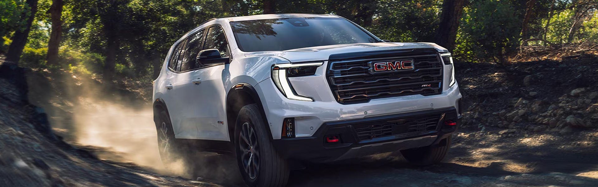 2026 GMC Acadia with a bold front grille and modern SUV design